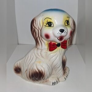 Vintage Ceramic Dog Figurine with Red Bow
